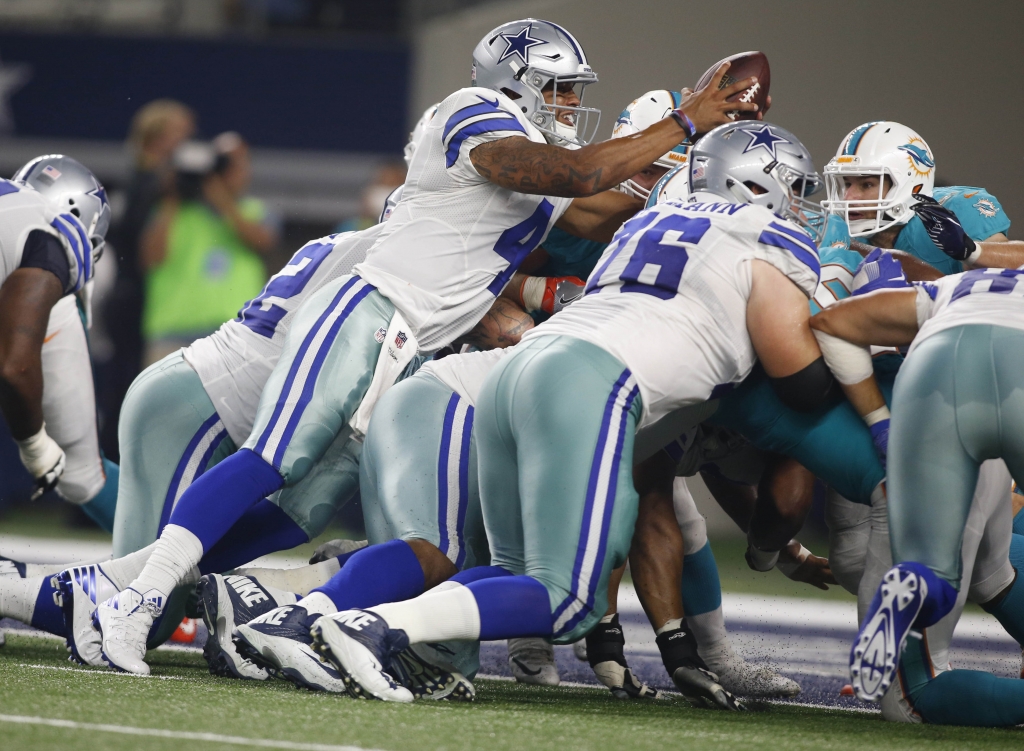 Aug 19 2016 Arlington TX USA Dallas Cowboys quarterback Dak Prescott dives for a touchdown in the third quarter against the Miami Dolphins at AT&T Stadium. Dallas won 41-14. Mandatory Credit Tim Heitman-USA TODAY Sports