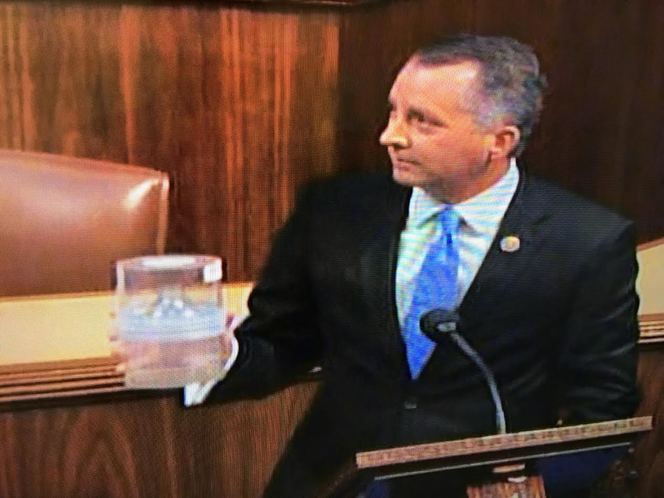 Rep. David Jolly of Pinellas County and a container of mosquitoes