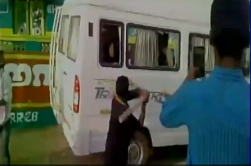 Screenshot from a video showing a bus from Karnataka being vandalised in Rameswaram Tamil Nadu. Credit Twitter