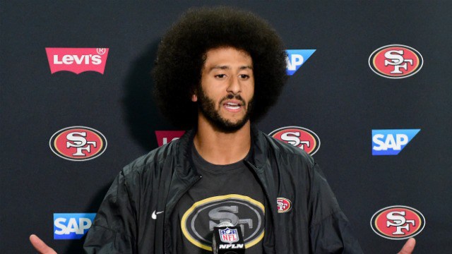 Colin Kaepernick #7 of the San Francisco 49ers speaks to media during a press conference after a 31-21 preseason win over the San Diego Chargers at Qualcomm Stadium