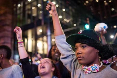 Demonstrators march in protest in Charlotte N.C