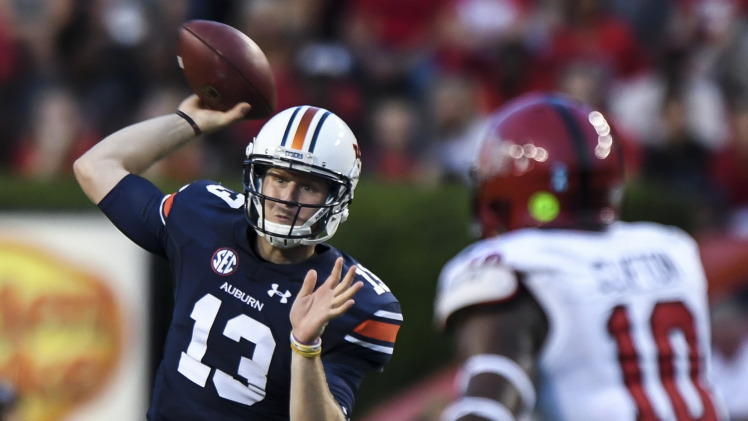 Sean White passed for three touchdowns and showed running ability too in Auburn's win