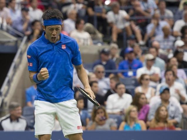 Kei Nishikori reacts to a point against Andy Murray during their 2016 US Open men's singles quarterfinals match