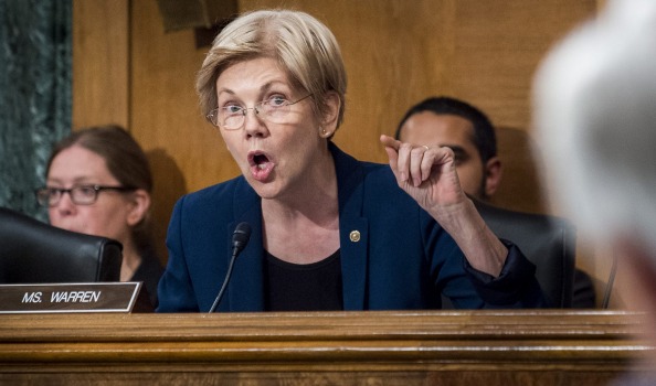 Senator Elizabeth Warren a Democrat from Massachusetts questions John Stumpf