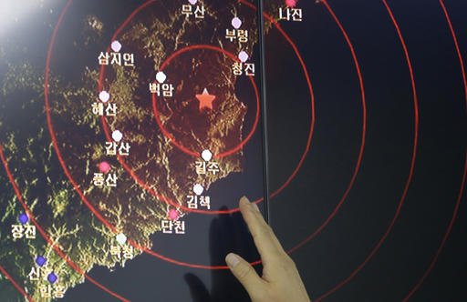 An official of the Earthquake and Volcano of the Korea Monitoring Division points at the epicenter of seismic waves in North Korea in Seoul South Korea Friday Sept. 9 2016. South Korea's Yonhap news agency says Seoul believes North Korea has conducte