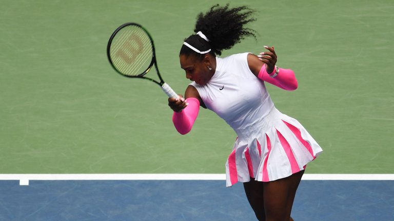 Serena Williams powered past Johanna Larsson to make the last 16 at the US Open and set more records