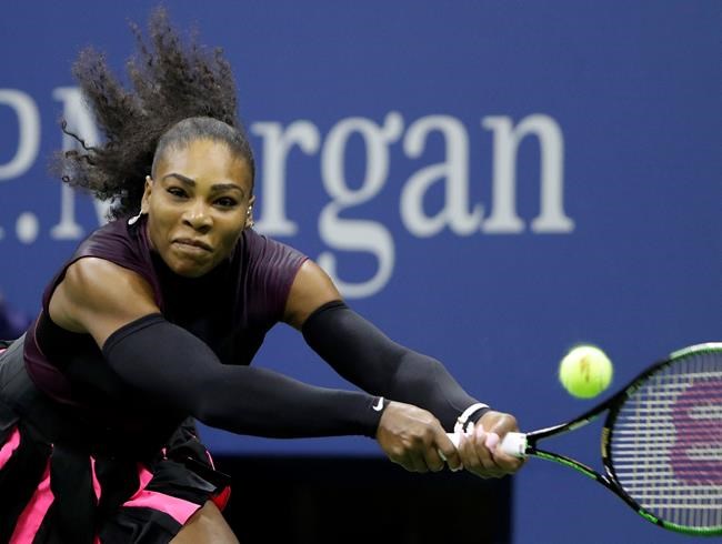 Serena Williams of the United States returns a shot to Vania King of the United States at the U.S. Open tennis tournament Thursday Sept. 1 2016 in New York