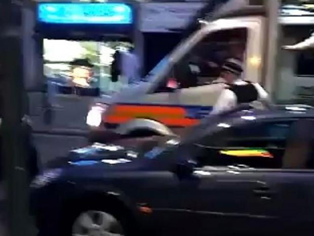 Mass brawl: Police descend on park as shocking footage shows '100 youths' armed with STICKS do battle in London