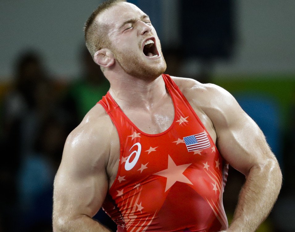 Kyle Snyder of the U.S. celebrates after winning his semifinal match in the 97-kilogram freestyle wrestling division on his way to a gold medal