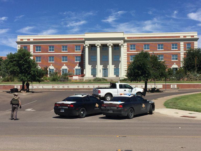 Texas Department of Public Safety troopers monitor the situation at Sul Ross State University in Alpine amid a campus-wide lockdown on Thursday