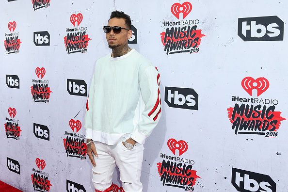 Singer Chris Brown attends the iHeartRadio Music Awards at The Forum