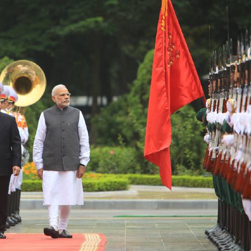 Minister Narendra Modi center escorted by Vietnamese Prime Minister Nguyen Xuan Phuc left inspects an honor guard during a welcome ceremony in Hanoi Vietnam Saturday Sept.3 2016. Military cooperation tops the agenda during Modi