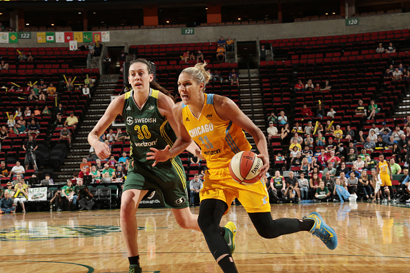 SEATTLE WA- JULY 17 Elena Delle Donne #11 of the Chicago Sky drives to the basket against Breanna Stewart #30 of the Seattle Storm on July 17 at Key Arena in Seattle Washington