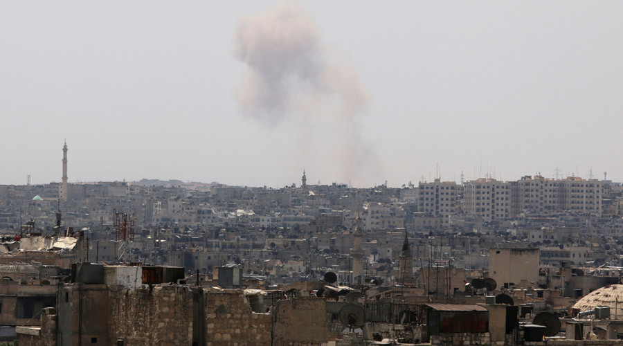 Smoke rises from Ramousah as seen from a rebel-held area of Aleppo Syria