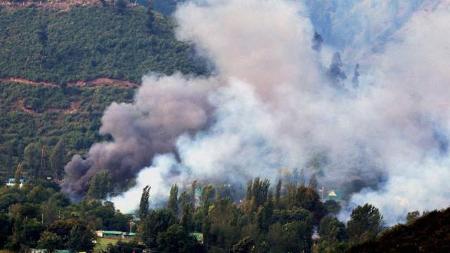 Smoke rises from the army brigade camp during a terror attack in Uri Jammu and Kashmir