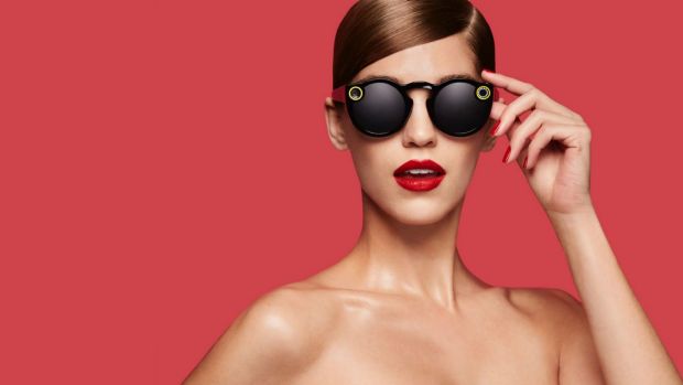 Snap's Spectacles have a camera mounted on one hinge and a large circular light mounted on the other so people know