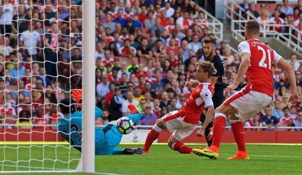 Liverpool's Adam Lallana scores the second goal against Arsenal during the FA Premier League match at the Emirates Stadium