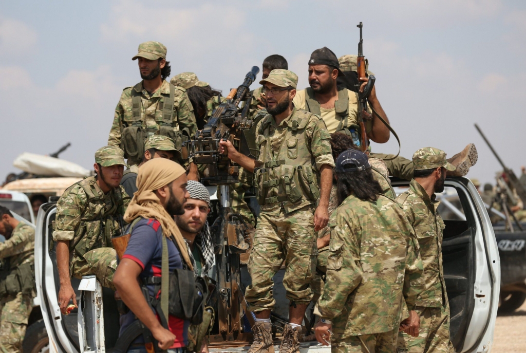 JARABLUS SYRIA- SEPTEMBER 03: Soldiers belonging to Free Syrian Army are seen as they are on their way to Al Rai village during Operation Euphrates Shield in Jarablus Syria