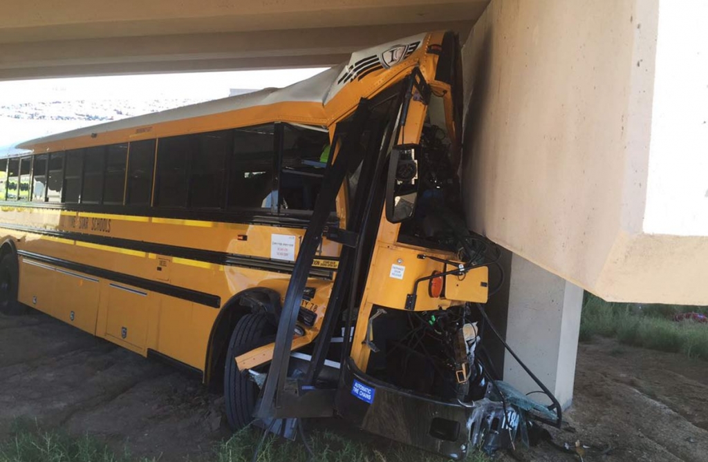 Denver Police Department a bus sits after crashing into a concrete pillar at Denver International Airport in Denver