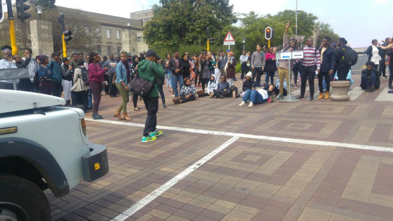 Students protest at Wits University on Monday in protest at looming fee increases and threaten to shut down the institution