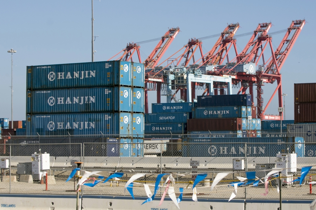 South Korea's Hanjin Shipping Co. container ship Hanjin Montevideo top is anchored outside the Port of Long Beach in Long Beach Calif