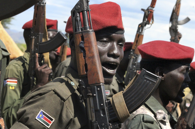 14 2016 government soldiers follow orders to raise their guns during a military parade in Juba South Sudan