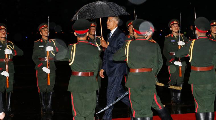 U.S. President Barack Obama is greeted with an honor guard and red carpet as he arrives aboard Air Force One ahead of the ASEAN Summit at Wattay International Airport in Vientiane Laos