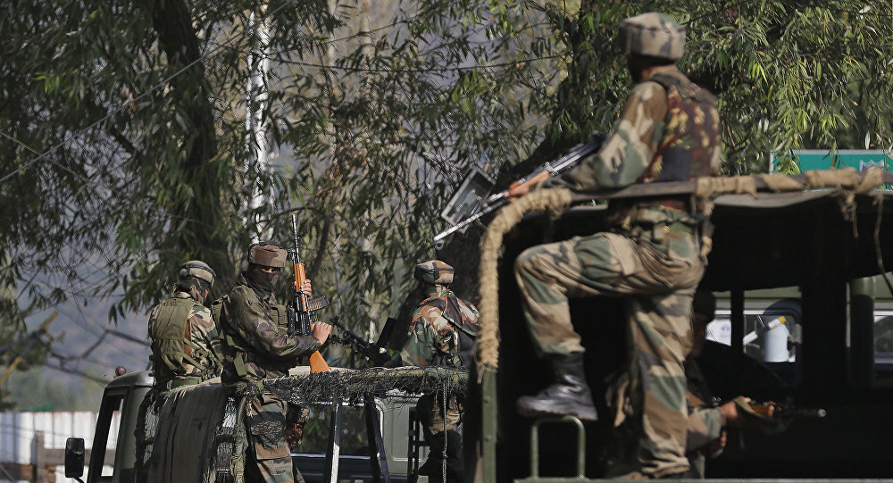 Indian soldiers guard outside the army base which was attacked Sunday by suspected militants at Uri Indian controlled Kashmir Monday Sept. 19 2016