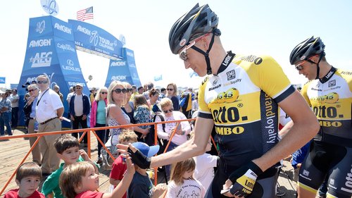 Stage winner Gesink greets young fans before the start of racing