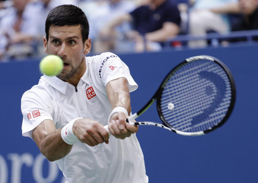 Novak Djokovic of Serbia returns a shot to Gael Monfils of France during the semifinals of the U.S. Open tennis tournament Friday Sept. 9 2016 in New York. AP