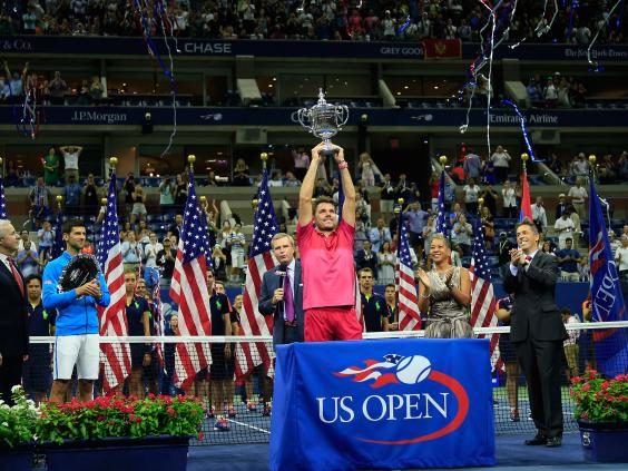 Stan Wawrinka lifts the US Open trophy