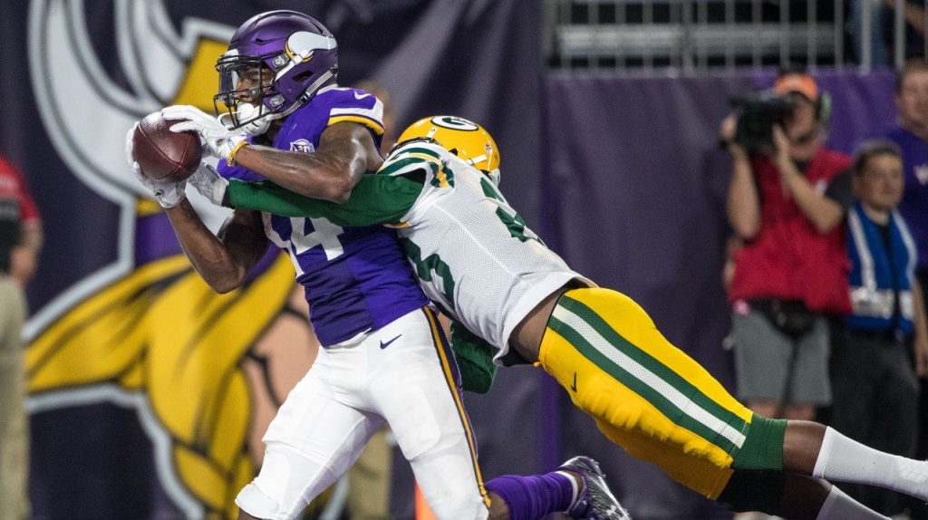 Stefon Diggs hauls in a touchdown pass against Green Bay Sunday night