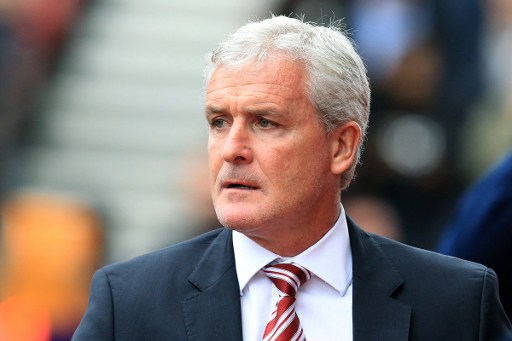 Stoke City's Welsh manager Mark Hughes waits ahead of the English Premier League football match between Stoke City and Tottenham Hotspur at the Bet365 Stadium in Stoke-on-Trent central England