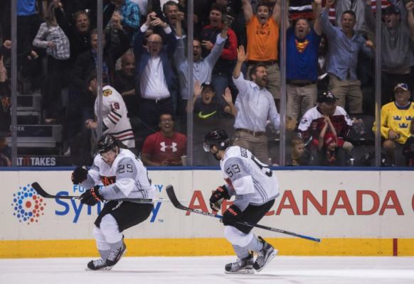 Team North America's Nathan MacKinnon left celebrates his