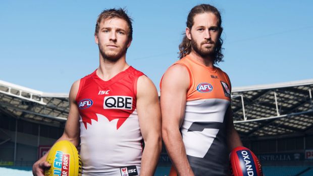 Sydney Swans skipper Kieren Jack and GWS Giant Callan Ward at ANZ Stadium