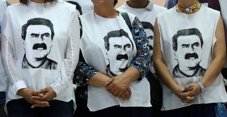 Pro-Kurdish politicians wearing t-shirts featuring Abdullah Ocalan gather to start a hunger strike to demand the right to visit the jailed PKK militant leader Ocalan in Diyarbakir