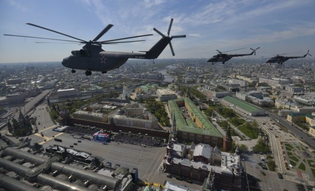 Russian Mil Mi-26 Halo helicopter flies over the Red Square during the Victory Day parade in Moscow Russia