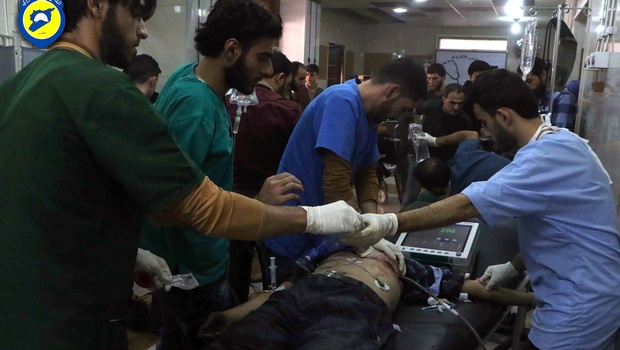 Syrian Civil Defense group known as the White Helmets shows wounded receiving treatment at a local clinic after airstrikes hit Aleppo Syria Sunday Sept. 25 2016