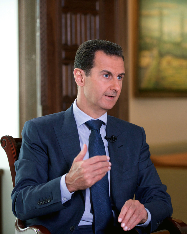 Syrian Presidency Syrian President Bashar Assad speaks to The Associated Press at the presidential