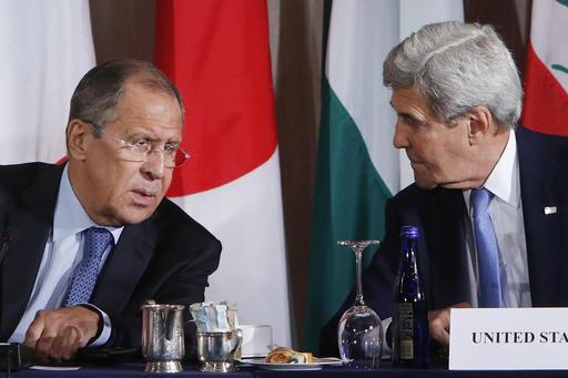 Russia's Foreign Minister Sergey Lavrov left and United States Secretary of State John Kerry talk during a meeting of the International Syria Support Group Thursday Sept. 22 2016 in New York