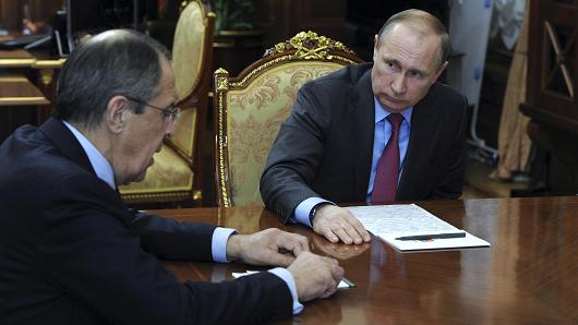 Russian President Vladimir Putin meets Foreign Minister Sergei Lavrov at the Kremlin in Moscow Russia