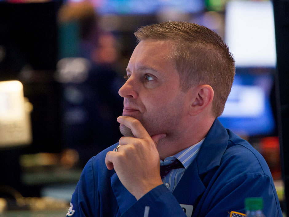 A trader works on the floor of the New York Stock Exchange