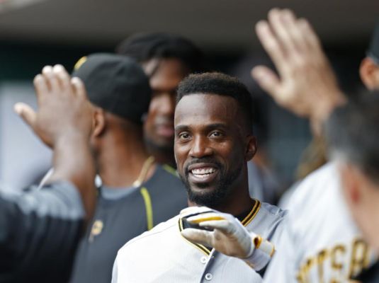 Pittsburgh Pirates Andrew McCutchen center is congratulated