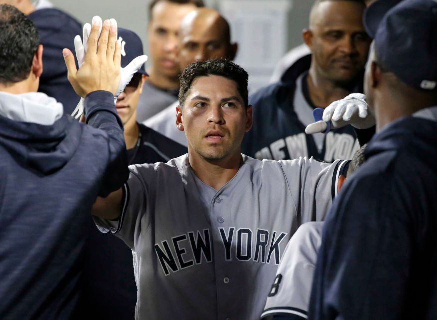 The New York Yankees Jacoby Ellsbury is greeted