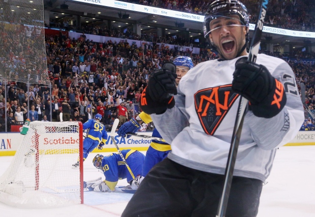 Team North America's Vincent Trocheck celebrates his first-period goal against Sweden Wednesday