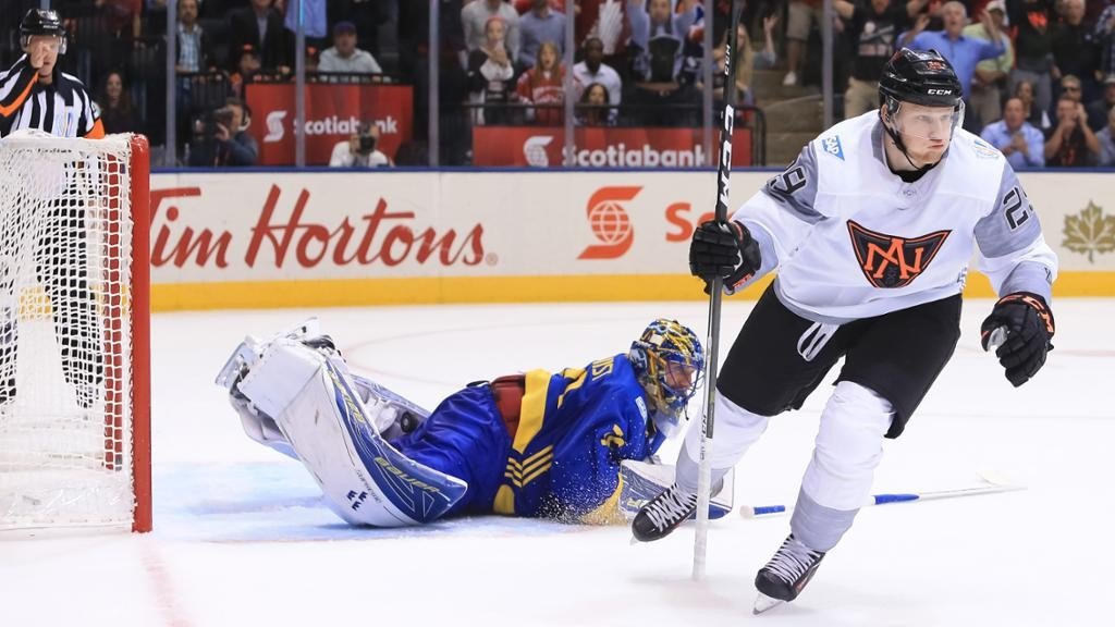 Team North America kept their hopes of reaching the World Cup of Hockey semi-finals alive as they claimed a dramatic 4-3 overtime victory over Sweden