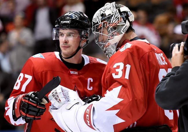 Canada's Sidney Crosby and goalie Carey Price look on before the end of third period World Cup of Hockey action against the Czech Republic in Toronto on Saturday