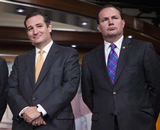 Sen. Mile Lee R-Utah right and Sen. Ted Cruz R Texas participate in a news conference on Capitol Hill in Washington. Donald Trump has added 10 new names to the list of judges he says he'll choose from to fill