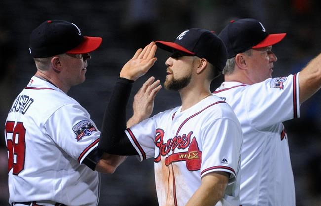 Atlanta Braves&#39 Ender Inciarte center celebrates with assistant hitting coach Jose Castro left as he comes off the field after a baseball game against the San Diego Padres Wednesday Aug. 31 2016 in Atlanta. Atlanta won 8-1