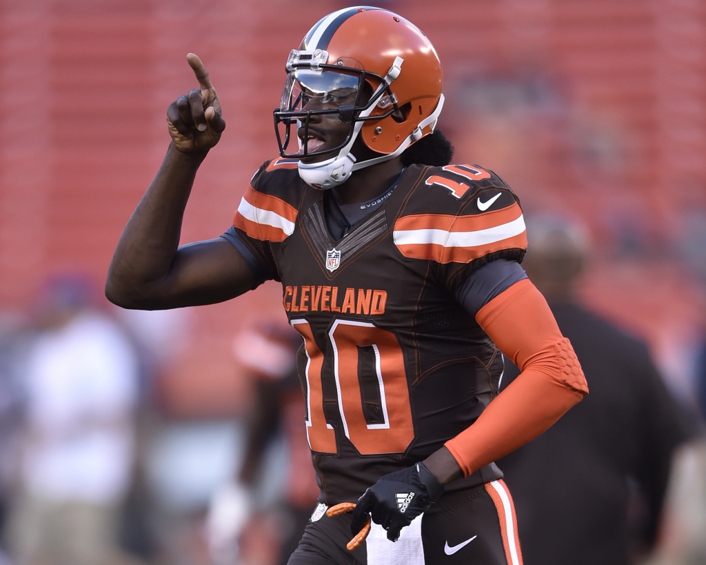 Cleveland Browns quarterback Robert Griffin III runs onto the field before an NFL preseason football game against the Chicago Bears in Cleveland. He's been reborn with the Browns who have given